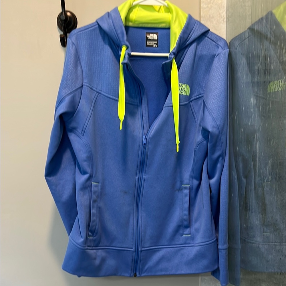 The North Face Woman’s Blue Hoodie with Neon Yellow Accents